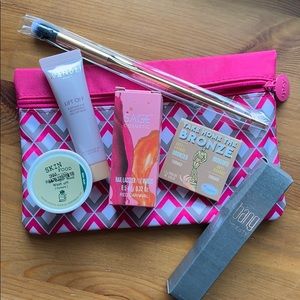 Ipsy glam bag and 6 makeup items